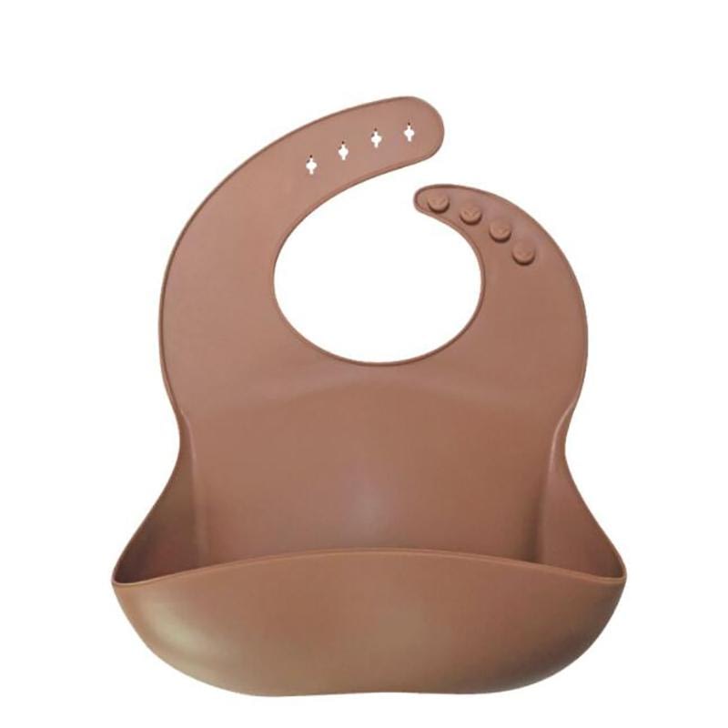 brown silicone wipe clean weaning bib for baby and toddlers