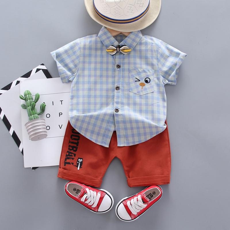 baby boys blue check short sleeve shirt and orange shorts with an owl outfit set