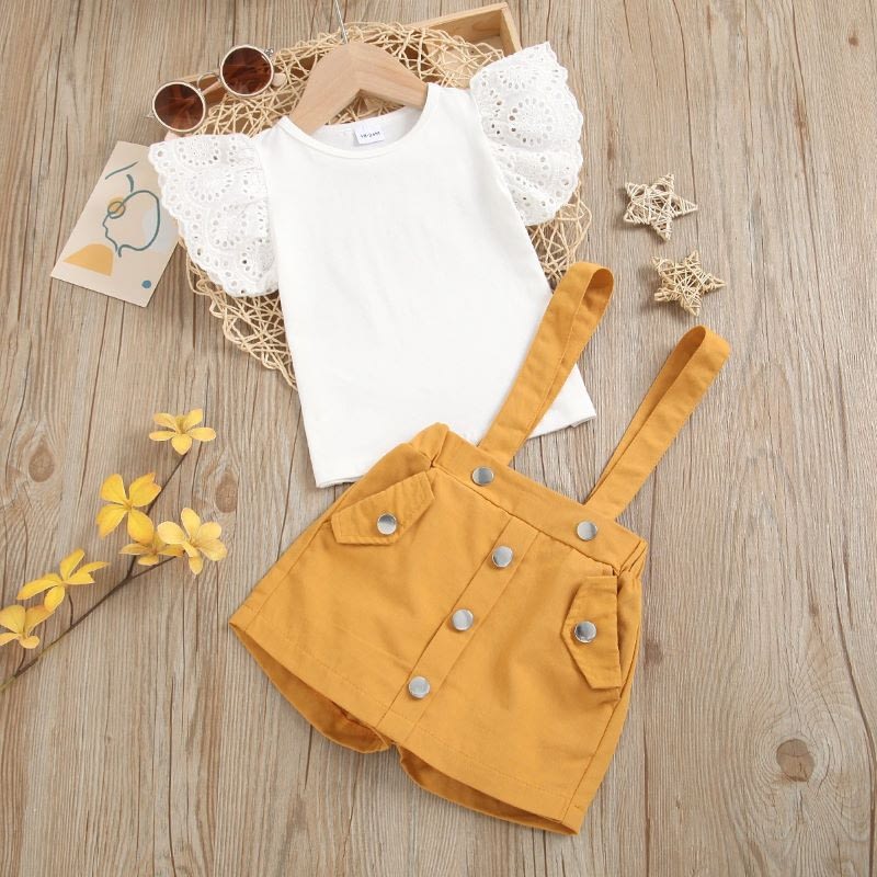 girls white top and mustard yellow pinafore skorts outfit set